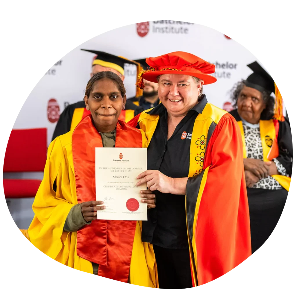 A photo of one of our participants Monica graduating with a Certificate I in Visual Arts
